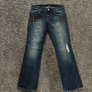 Women's Distressed Blue Jeans